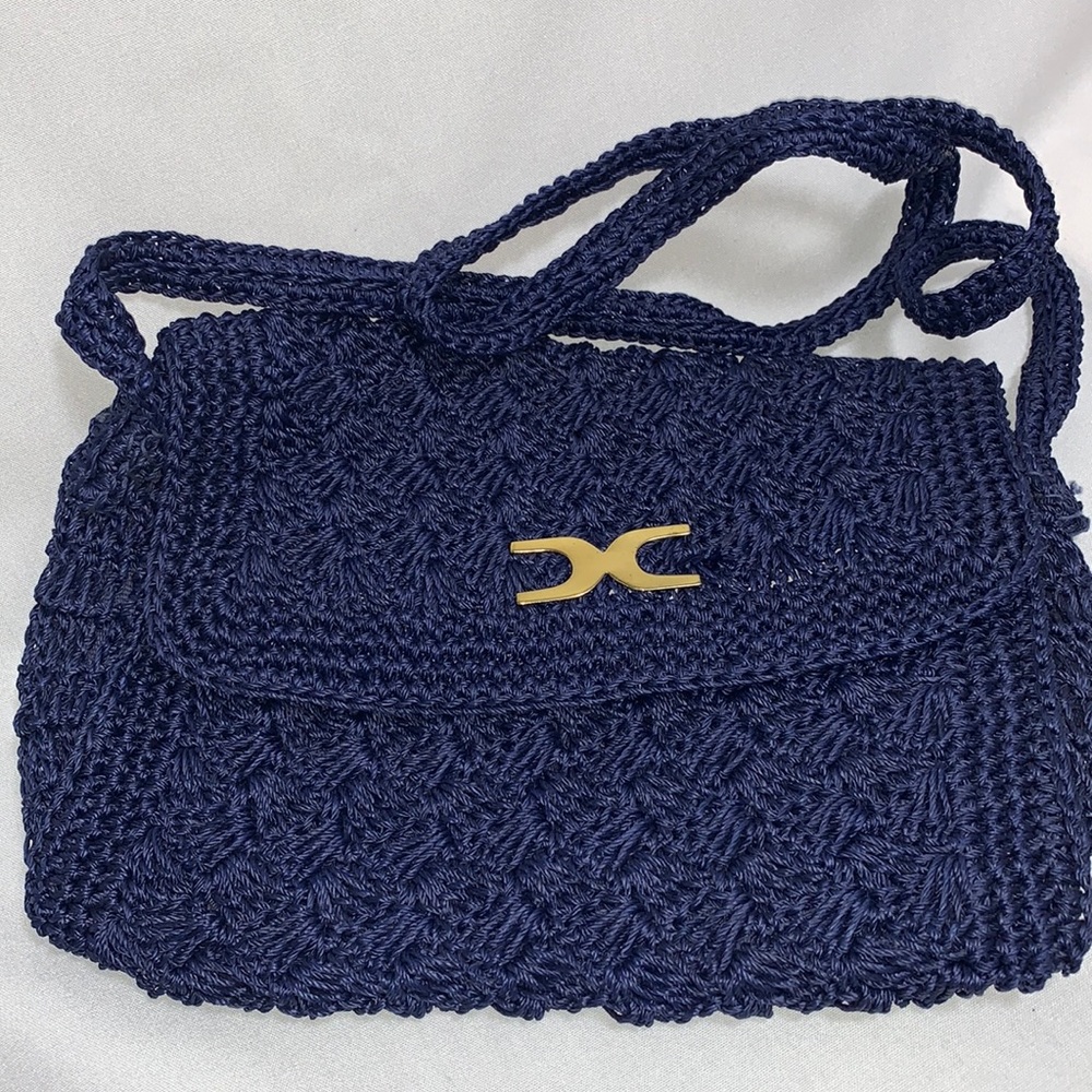 Dark blue crocheted purse made in Japan.